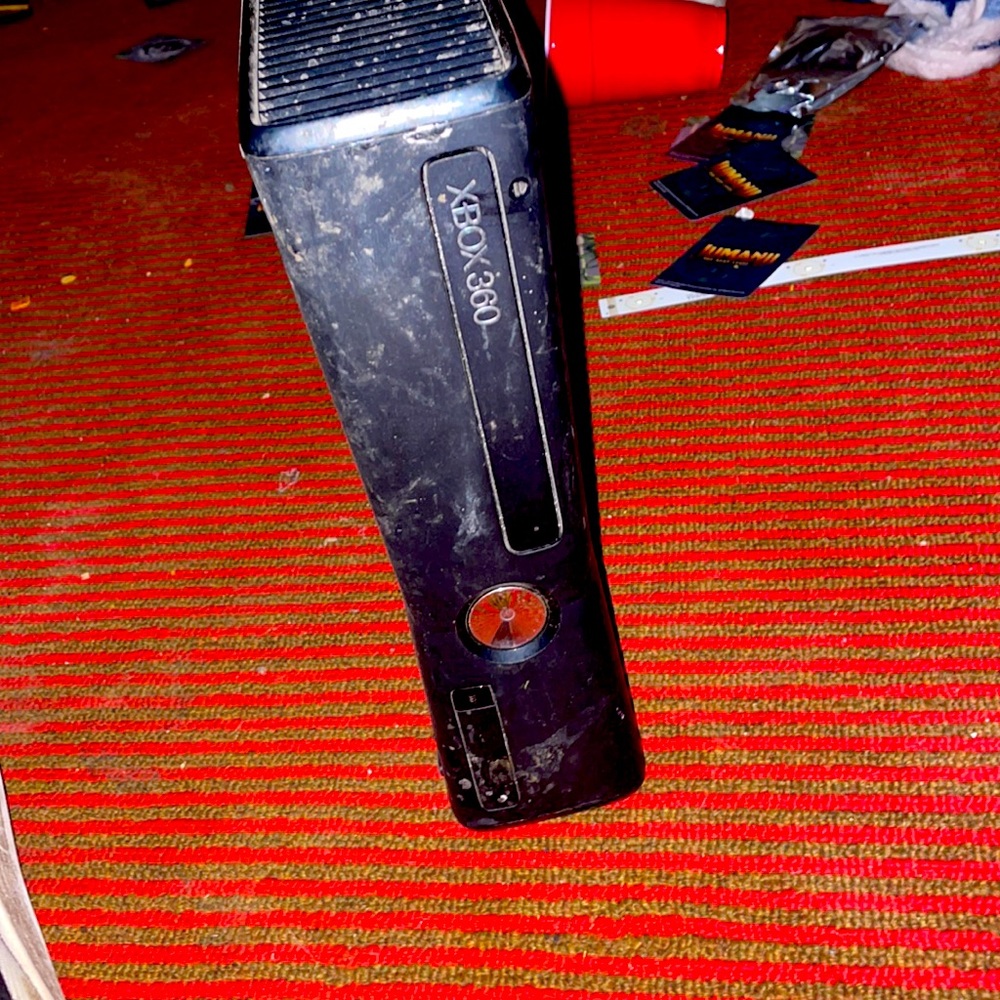 A black Xbox 360 with cords and let me know if want!!